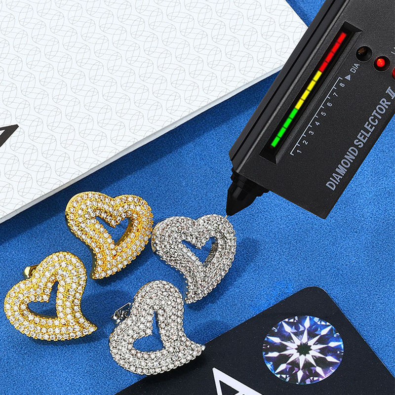 iced out earrings silver + moissanite